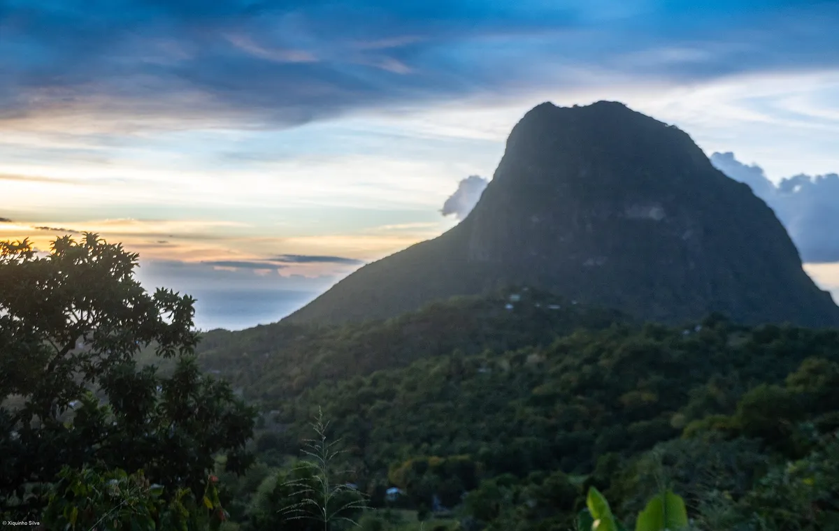 The Pitons of Saint Lucia rising from the Caribbean Sea with Petit Piton in the foreground